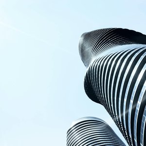 Futuristic and modern skyscrapers with curved designs in Mississauga, Ontario.