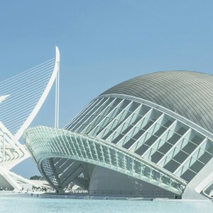 Futuristic design of Valencia's City of Arts and Sciences under a clear blue sky.