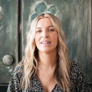 Authentic natural light headshot of a woman with blonde hair in Brevard, North Carolina.