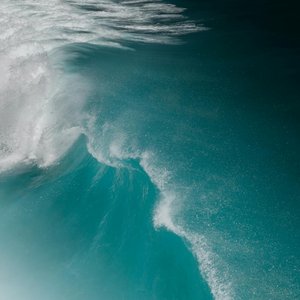 Captivating view of powerful turquoise ocean waves crashing at Pupukea, Hawaii.